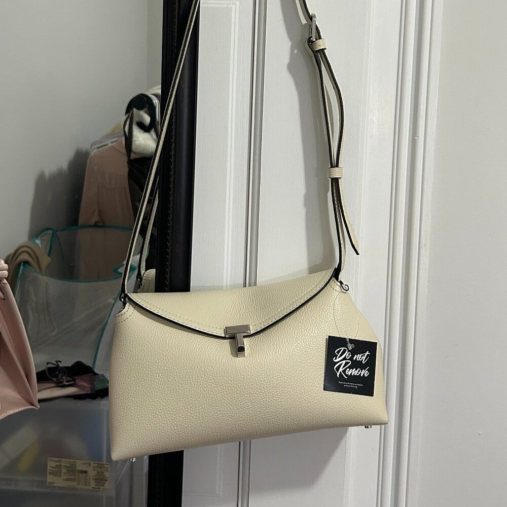 Toteme T Lock Clutch in Milk